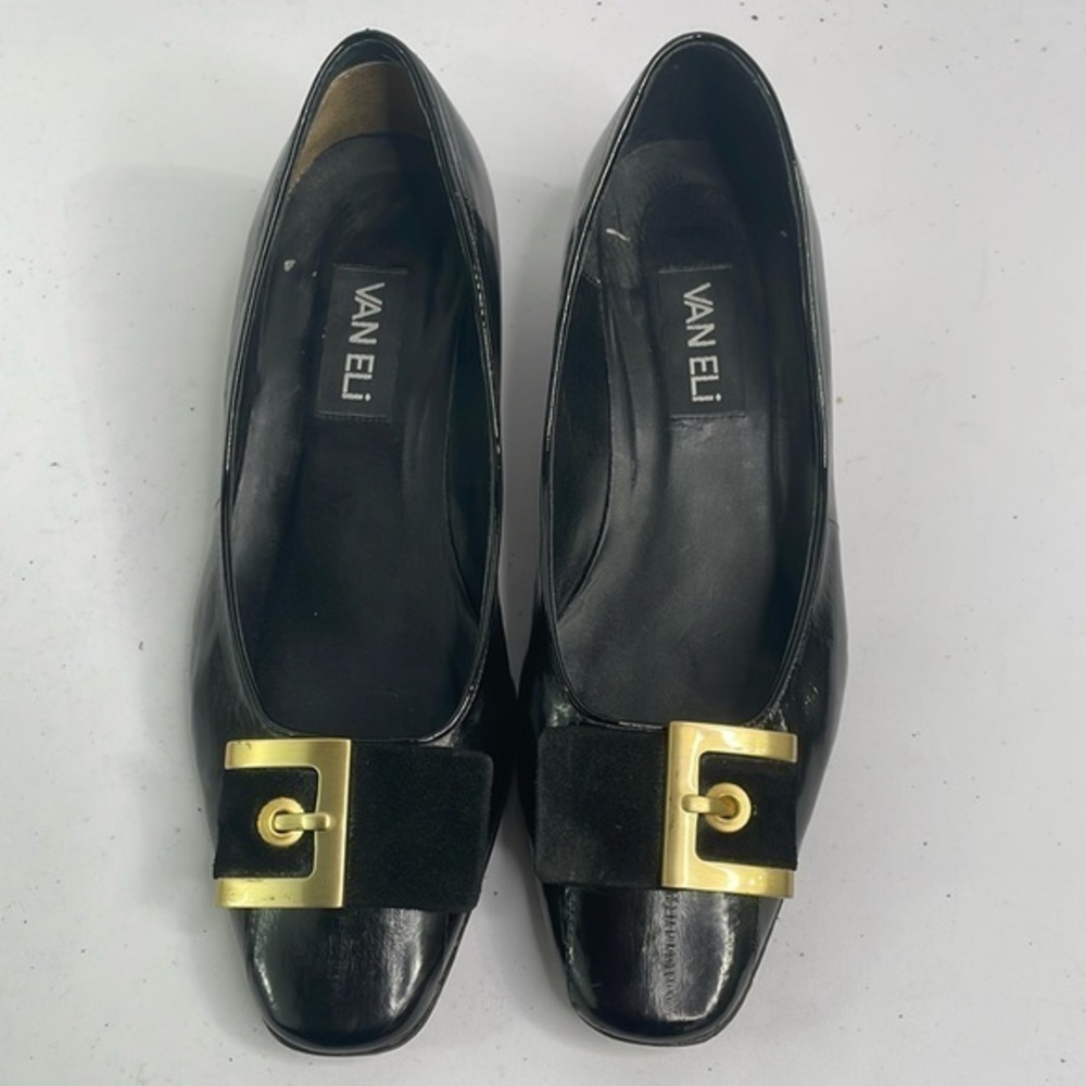Vaneli black eel skin? Pumps w rounded square toe. Suede and gold buckle detail.